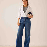 MERSEA ladies' travel-ready medium wash blue wide-leg denim Marlene trouser with a high-rise waist and floor-length hem.