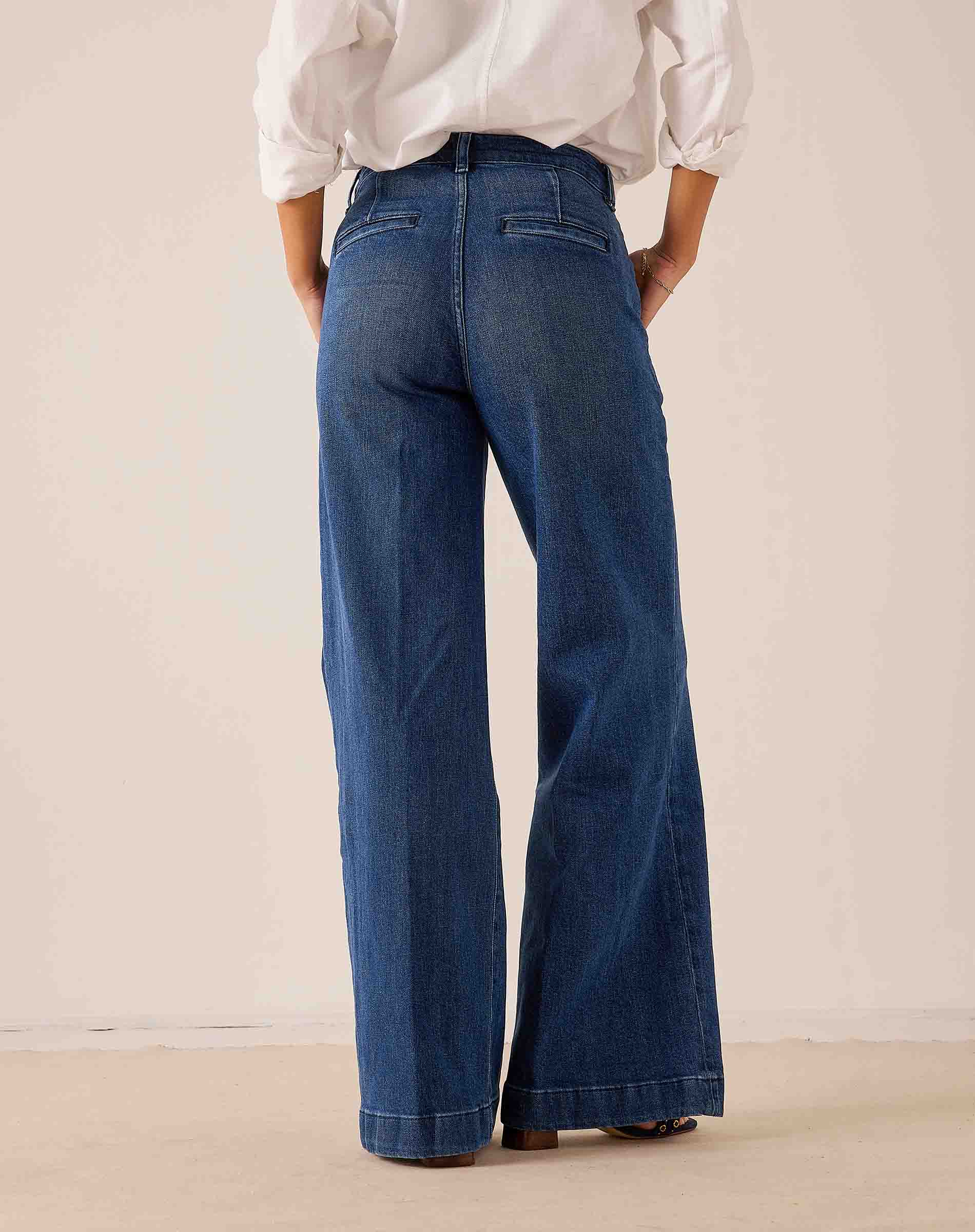 Medium wash blue wide-leg denim Marlene trouser with a high waist and decorative stitching.