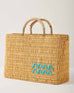 Market straw basket with tan leather handles and Aquarius symbol embroidered in light blue