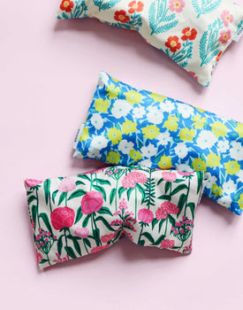 eye pillow in peony party, pop impatiens, and block print poppy