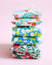 linen sachet sets stacked on top of each other