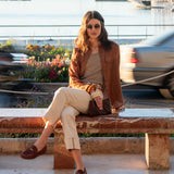 Ladies' travel-ready saddle brown double pocket shirt in a soft woven fabric.