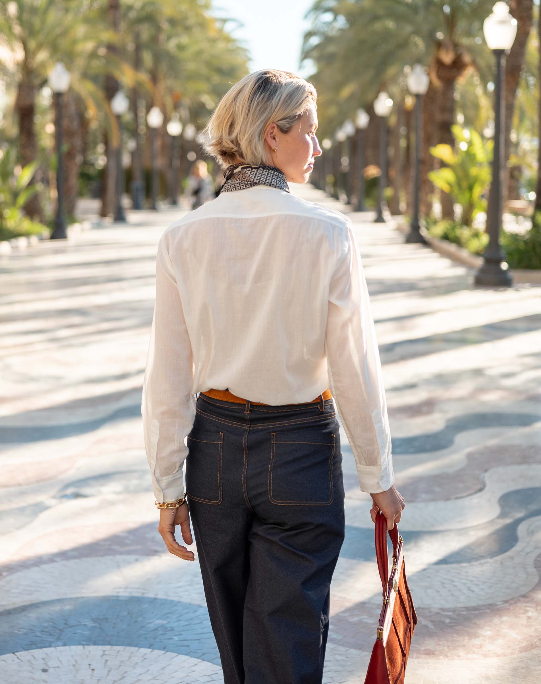 White cotton blend Miller button-up shirt with double pocket detail and relaxed fit.