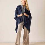 Navy blue textured travel wrap with open sides and a longline silhouette.