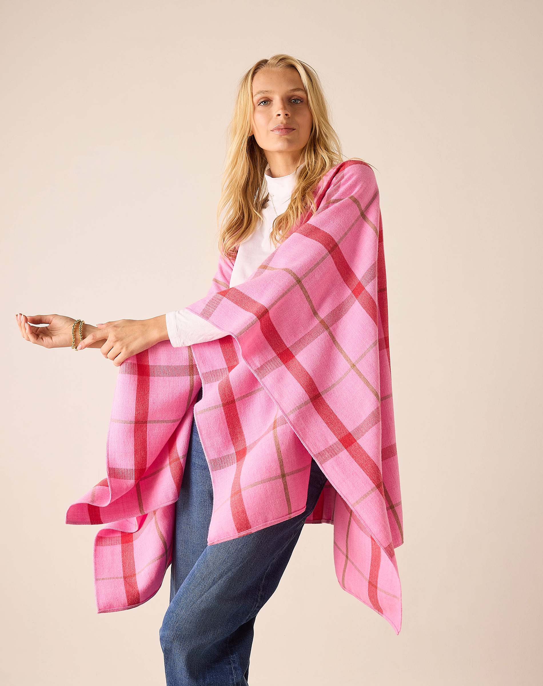 Peppermint plaid oversized wrap in soft pink and red tones featuring a large check pattern.
