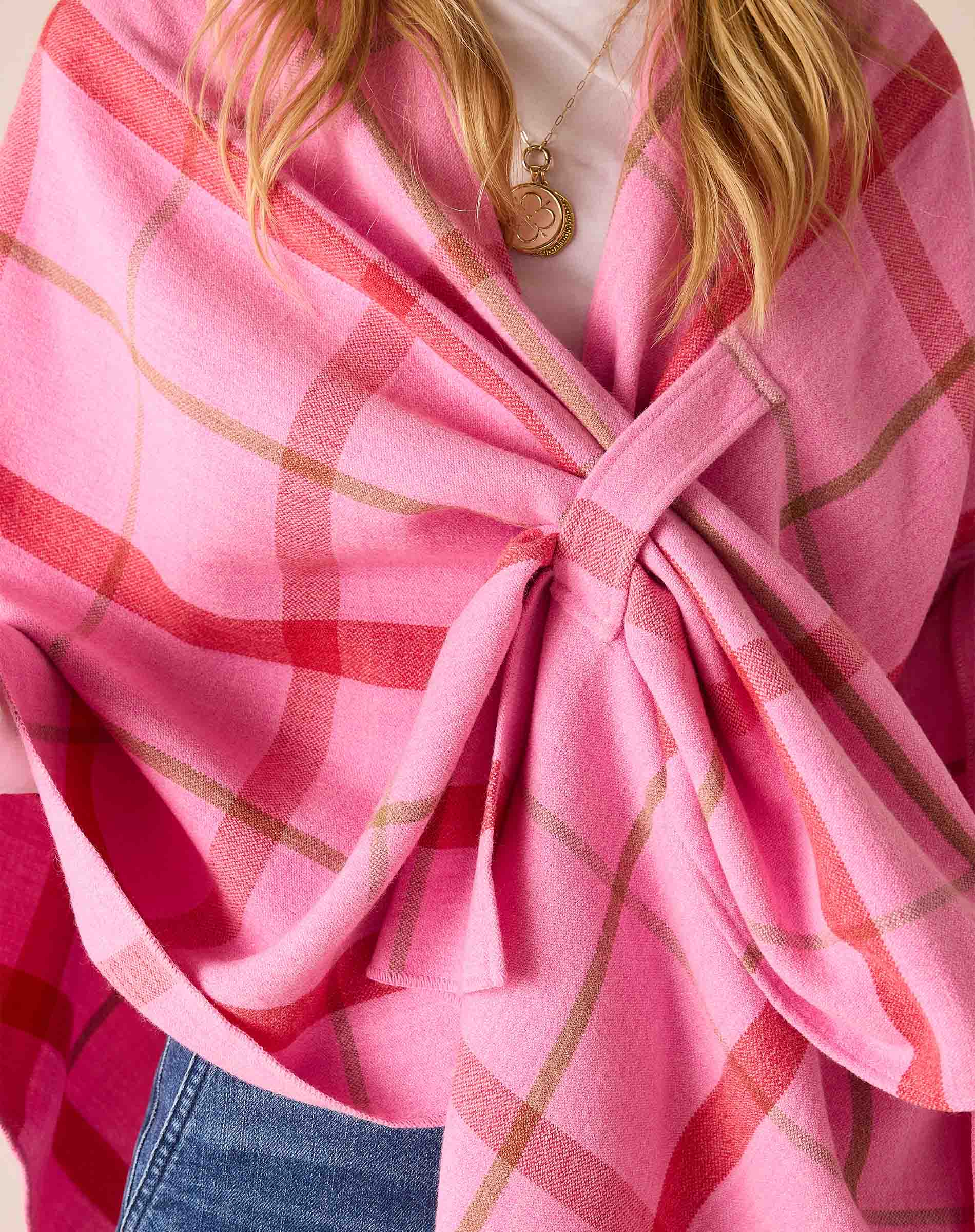 Peppermint plaid oversized wrap in soft knit fabric featuring a draped front design.