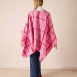 Back view of women's travel-friendly peppermint plaid oversized wrap with a wide-spread silhouette.