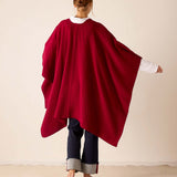 Back view of the wine-colored ribbed knit travel wrap.