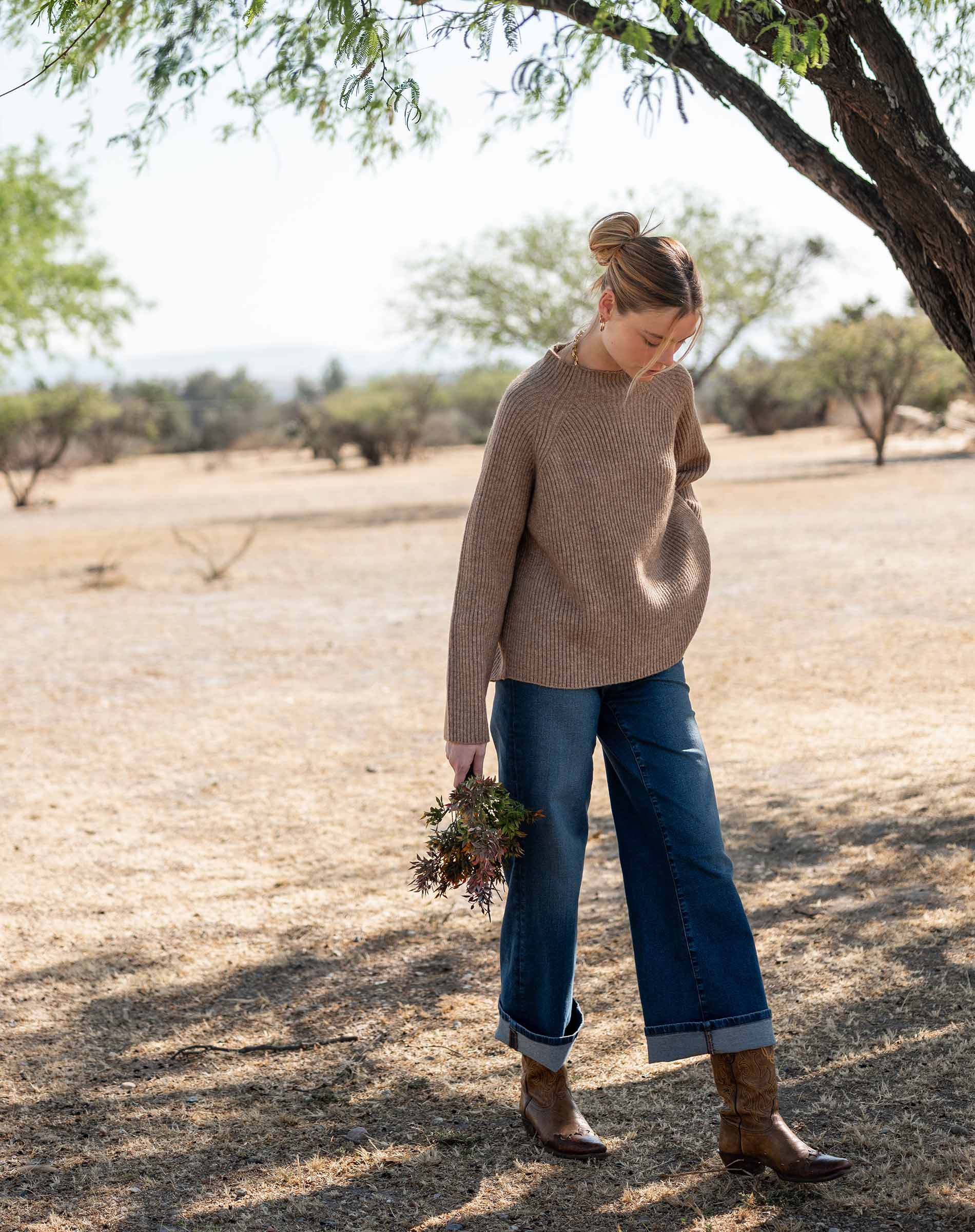Women's travel-friendly heathered driftwood mockneck knit sweater with a soft ribbed texture.