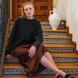 Ladies' travel-ready graphite grey ribbed knit Monograph sweater with a crew neck.