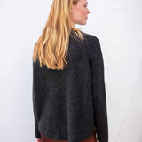 Graphite ribbed knit sweater with a draped back detail.
