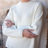 Winter white ribbed knit sweater.