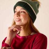 Forest green ribbed knit beanie with a cream stripe and faux fur pom-pom.
