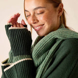 Sage green ribbed knit sweater with white stripe detailing and fingerless gloves.