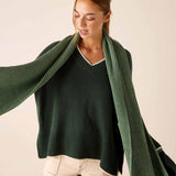 Olive green ribbed knit wrap scarf with frayed hem detail.