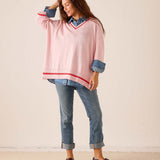 MERSEA women's travel-friendly pink and red V-neck knit sweater with oversized sleeves and horizontal stripe detailing.