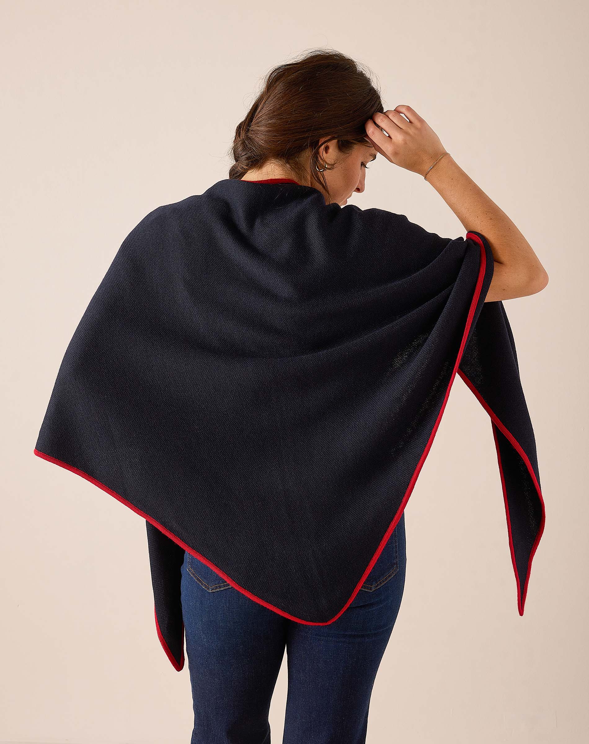 Navy and red oversized wrap scarf in a soft knit fabric.