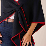 Navy and red draped wrap scarf with a front knot in a knit fabric.