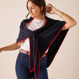 Navy blue and red travel scarf with a soft drape and cozy knit feel.