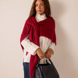 Women's travel-friendly wine pinkberry wrap scarf in soft knit fabric.