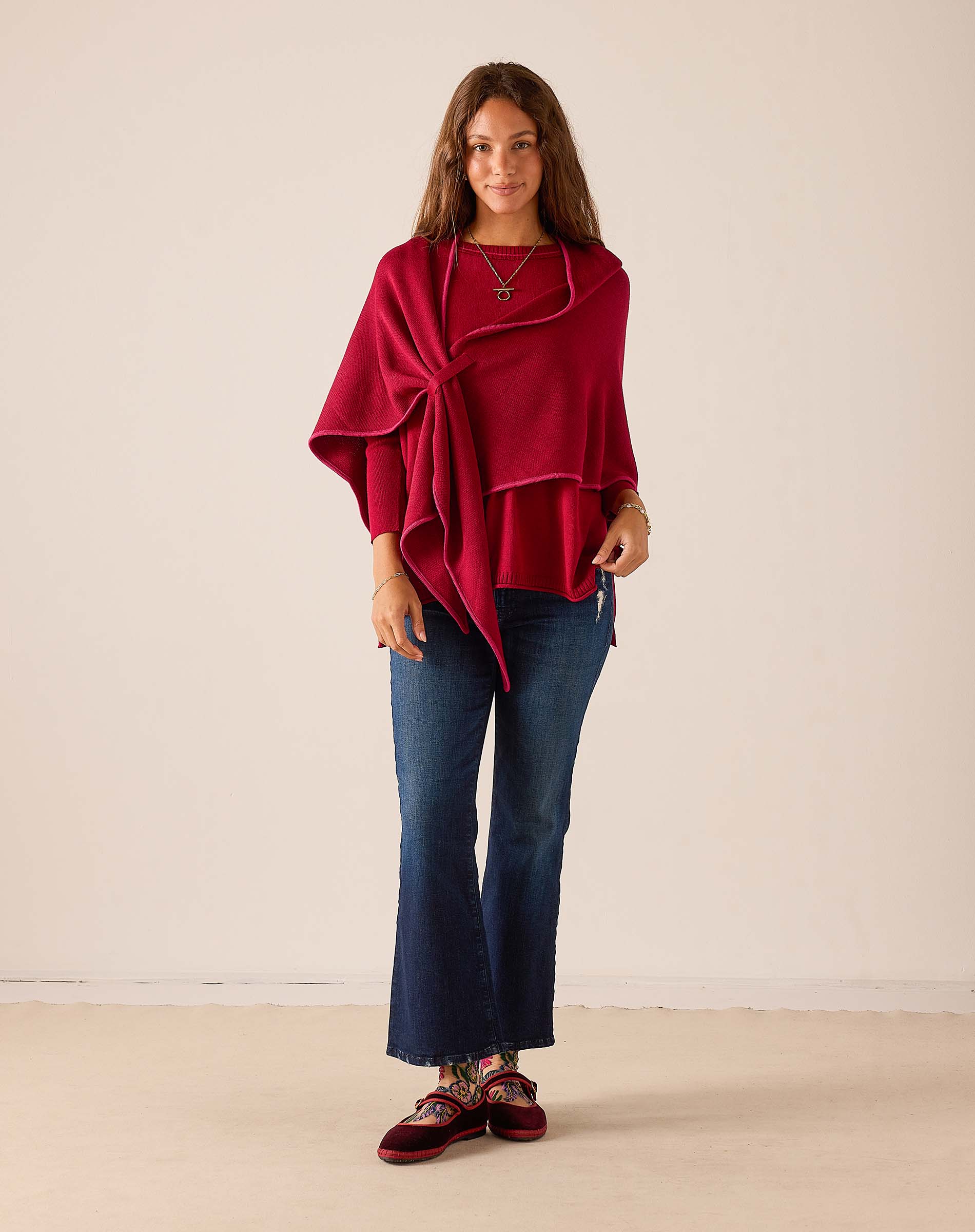 Wine pinkberry draped shawl wrap with a soft knit texture.