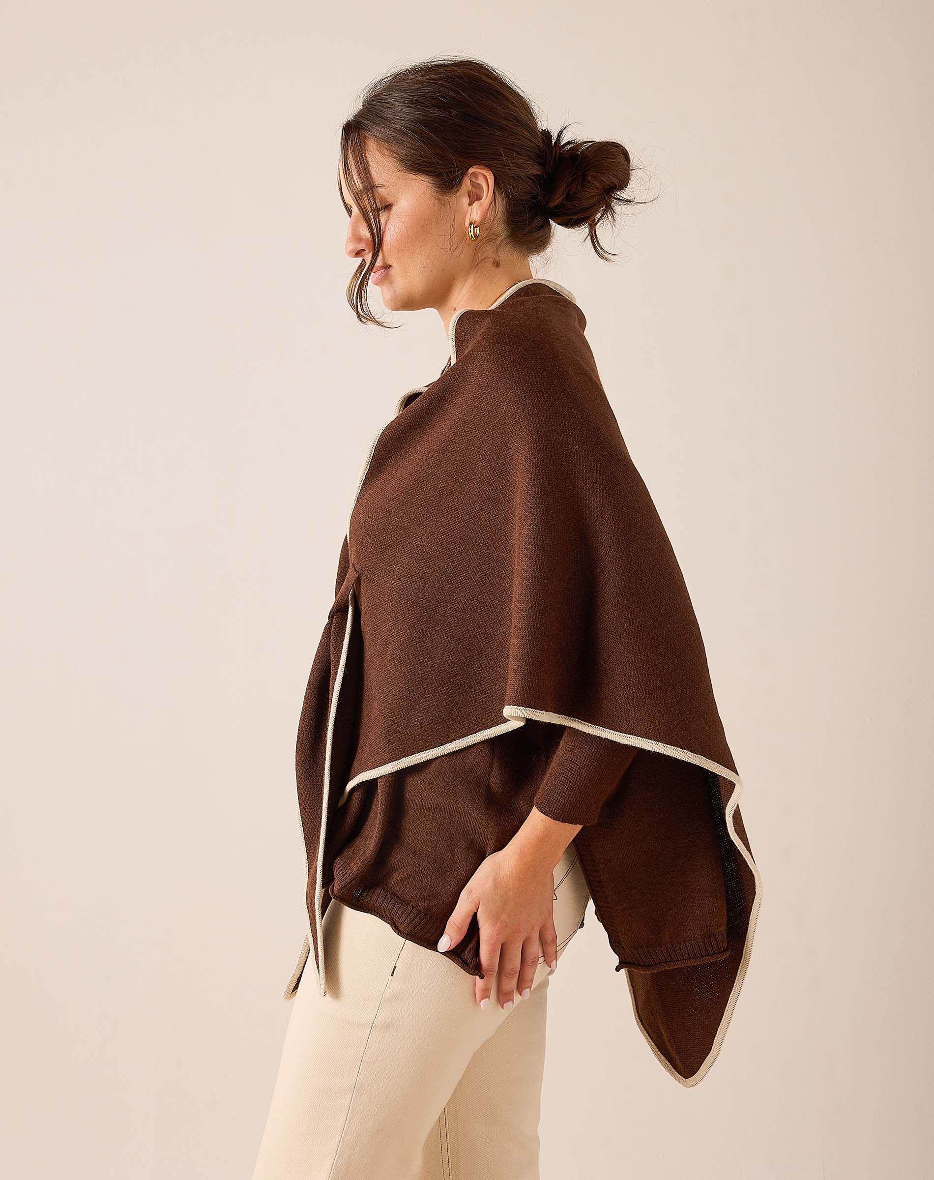 Coffee brown knit wrap with cream trim.