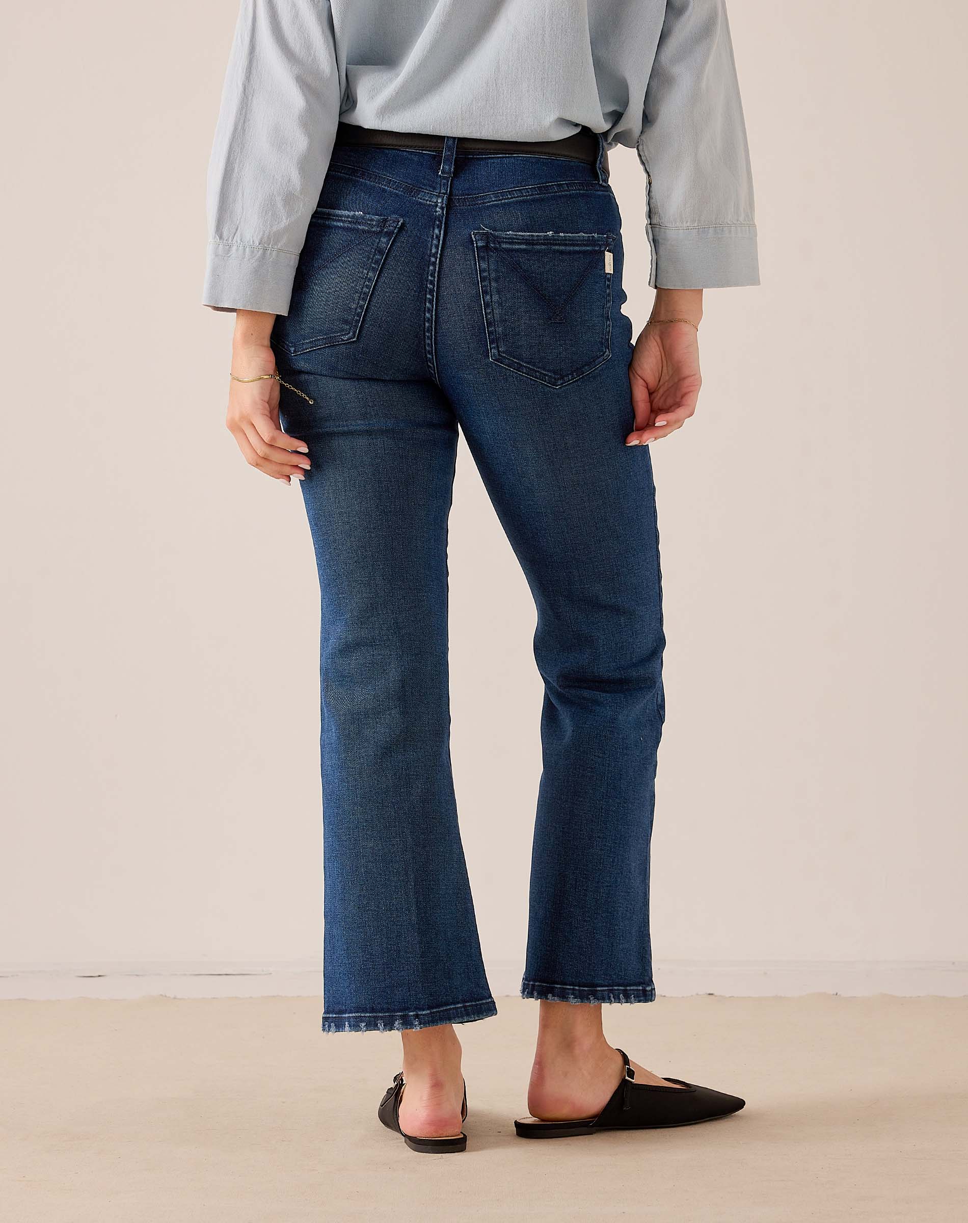 Navy blue flared leg denim jeans with back pockets