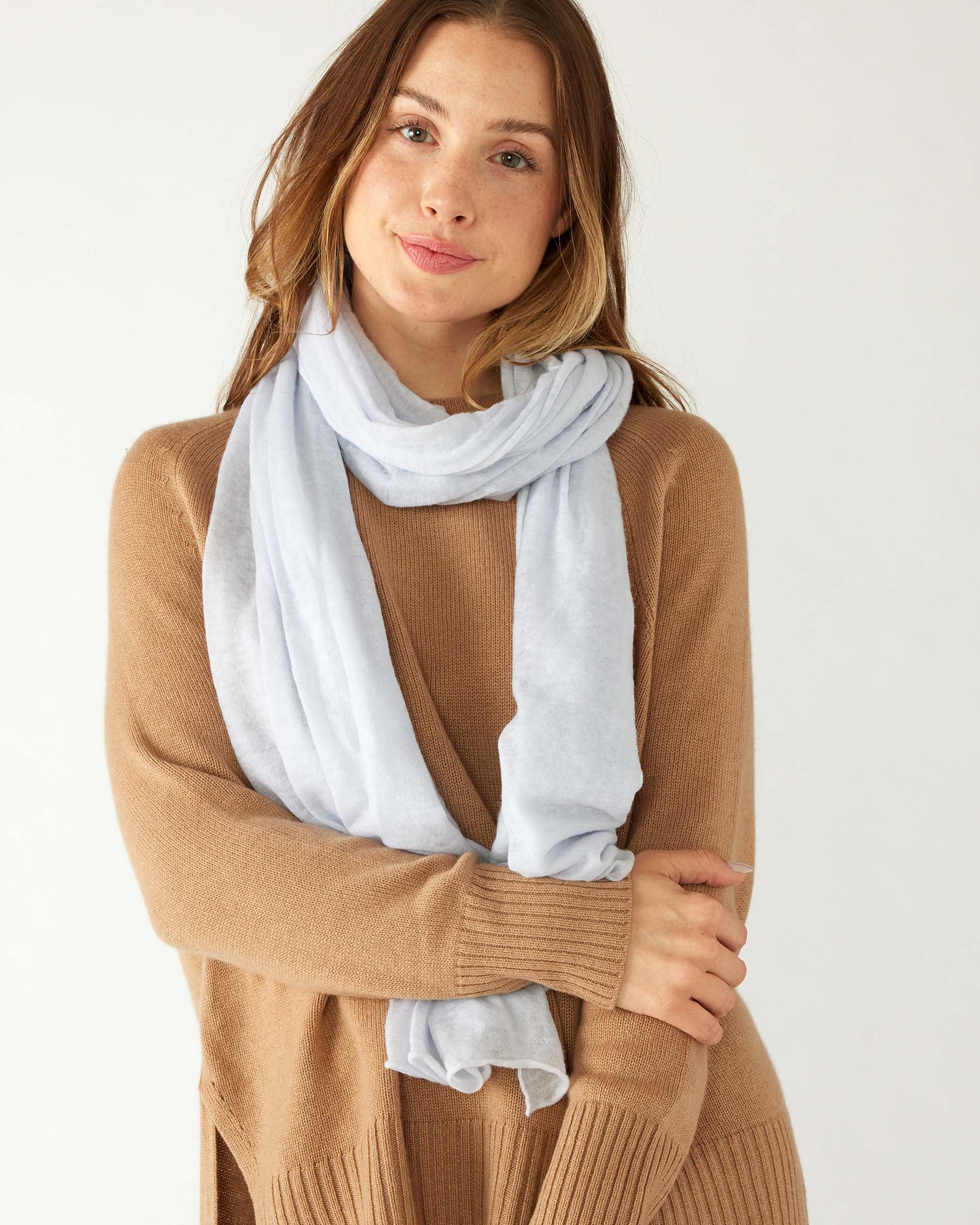 woman wearing mersea napa cashmere scarf in airy blue