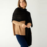 woman wearing mersea napa cashmere scarf in black