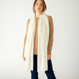 woman wearing mersea napa cashmere scarf in moonstone white