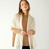 woman wearing mersea napa cashmere scarf in moonstone white