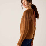 Cinder ribbed knit sweater featuring a wide ribbed texture and a largeer back ribbon detail.