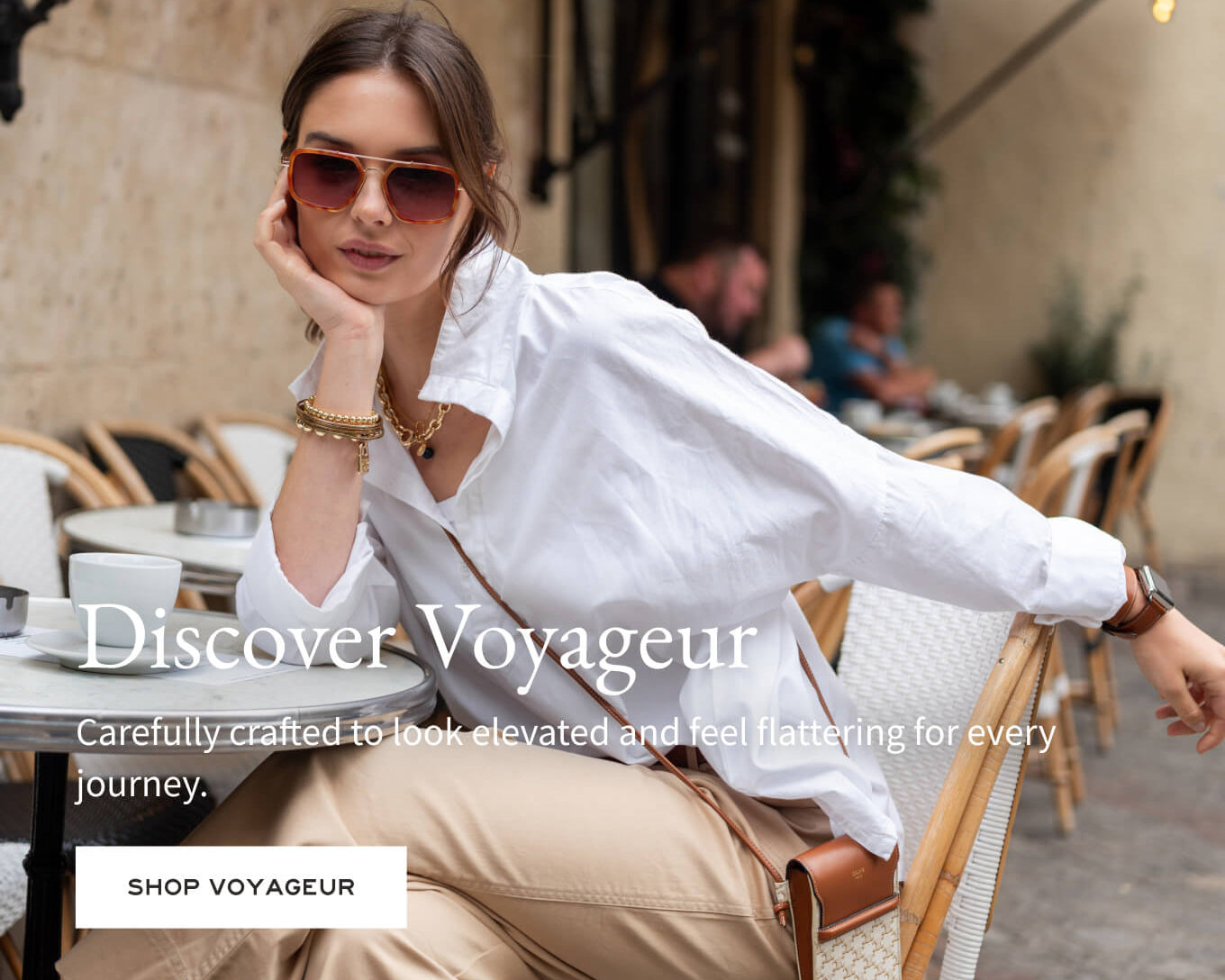 Woman sitting outdoors with 'Discover Voyageur' text overlay