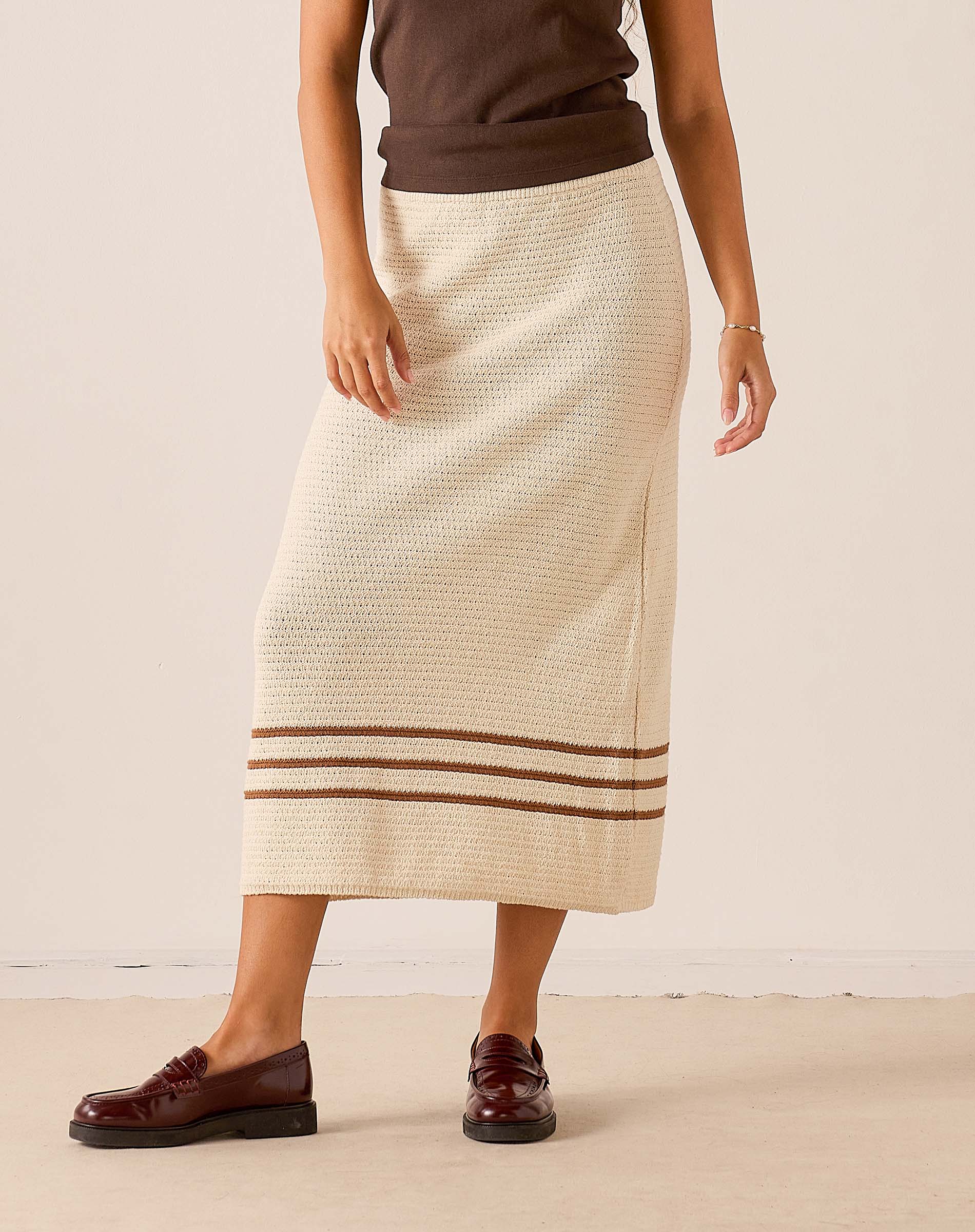 Women's travel-friendly ecru and almond crochet midi skirt with horizontal stripes and pointelle knit detail.