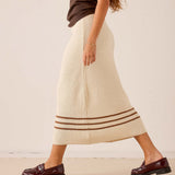 Ecru and almond crochet midi skirt with horizontal striped detailing.