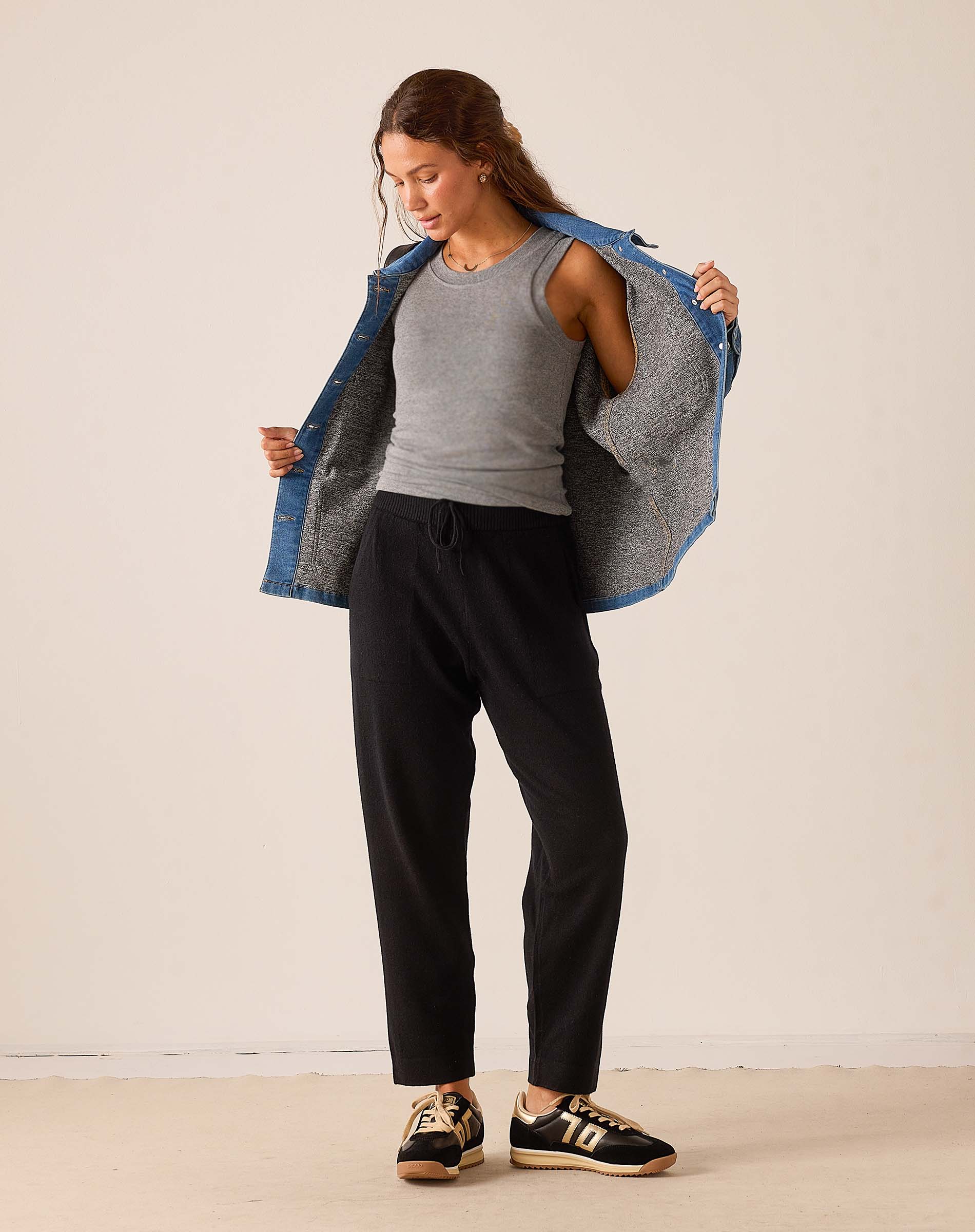 MERSEA ladies' travel-ready black tapered cashmere pants with an elastic drawstring waist.