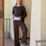 Mocha brown cashmere wide-leg pants with a relaxed fit and soft knit texture.