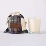 MERSEA ladies' travel-ready pumpkin whimsea plaid drawstring bag and a white candle in a clear glass jar. Text: "MERSEA PUMPKIN WHIMSEA"
