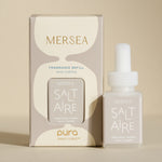 pura smart vial of mersea saltaire scent sitting next to boxed version of product