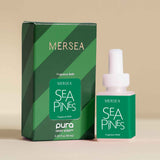Mersea Sea Pines fragrance refills with packaging on a beige background