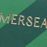 Gold text 'MERSEA' on a green background