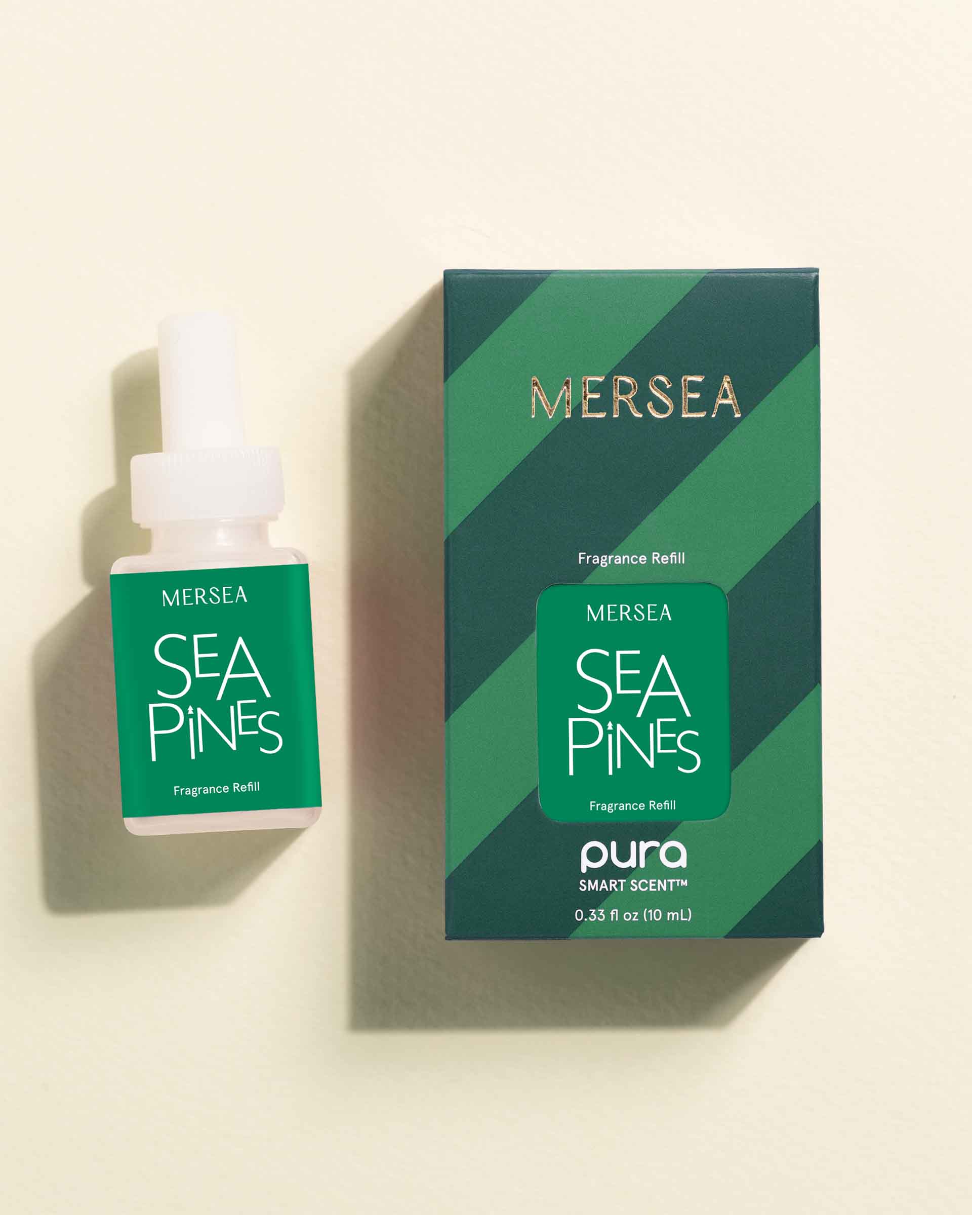 Mersea Sea Pines fragrance bottle and packaging on a beige background