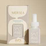 pura smart vial of mersea saltaire scent sitting next to boxed version of product