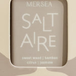 closeup of saltaire logo on boxed pura smart vial of mersea saltaire scent