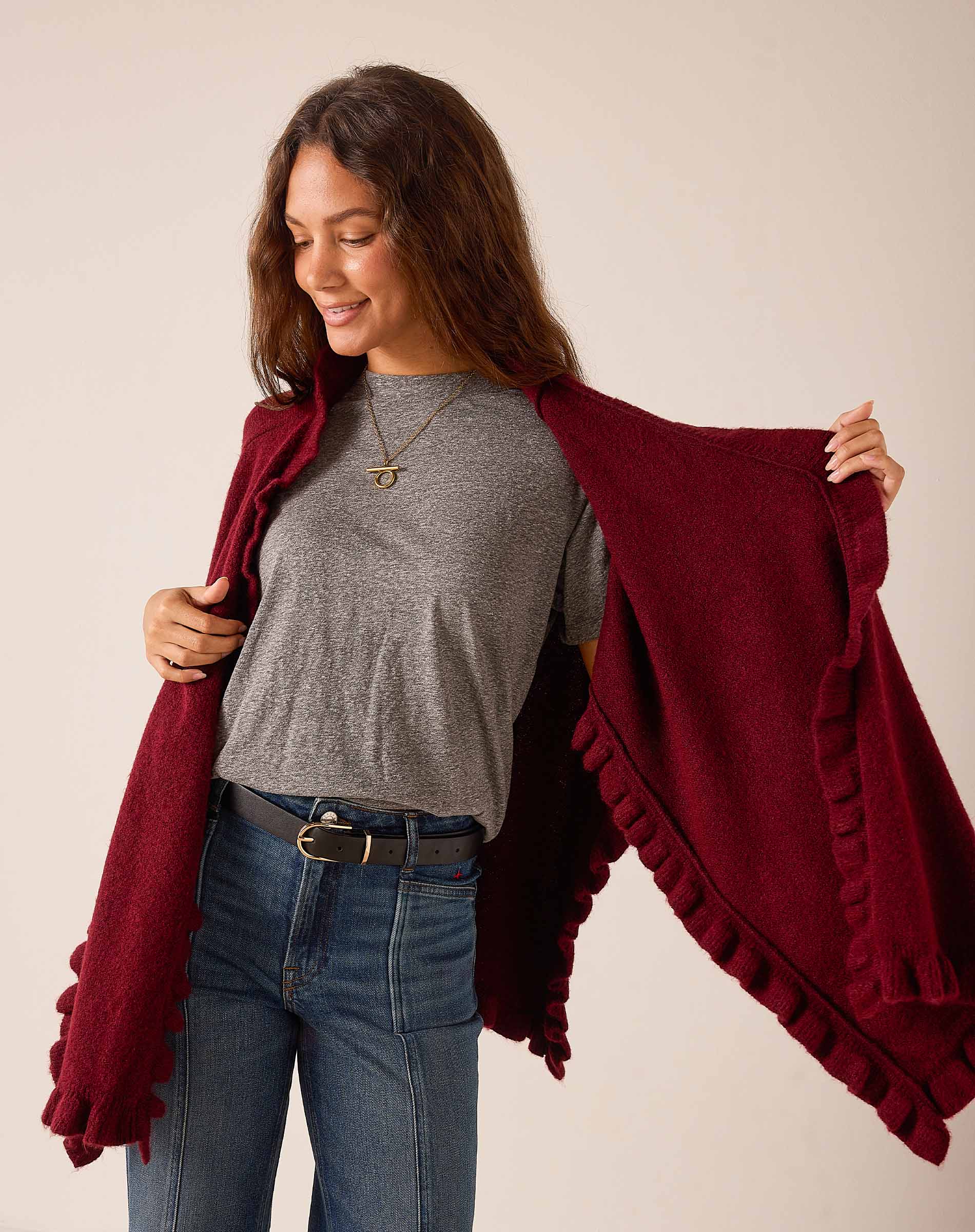 Cabernet burgundy ruffled wrap in a soft knit material.