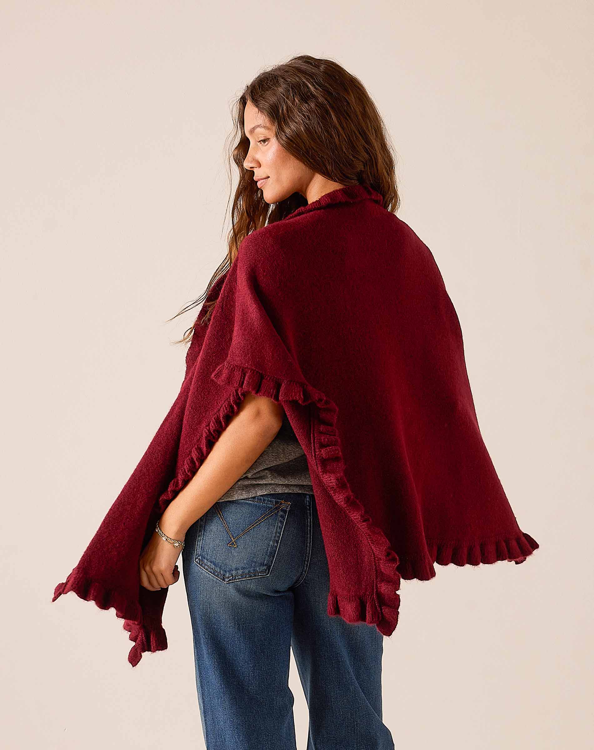 Cabernet red ruffled wrap with a soft knit finish.