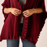 Cabernet red ruffle wrap with a soft knit texture.