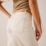 White wide-leg cropped trousers in a structured cotton blend with a decorative back pocket and tan leather belt.