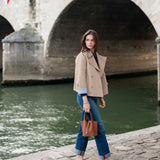 MERSEA women's travel-friendly classic khaki pea coat with wide lapels and button details.