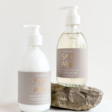 saltaire hand soap and shea lotion laying on a white background